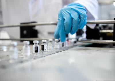 pharmaceutical,factory,and,industrial,mass,production,of,vaccine,bottles,against